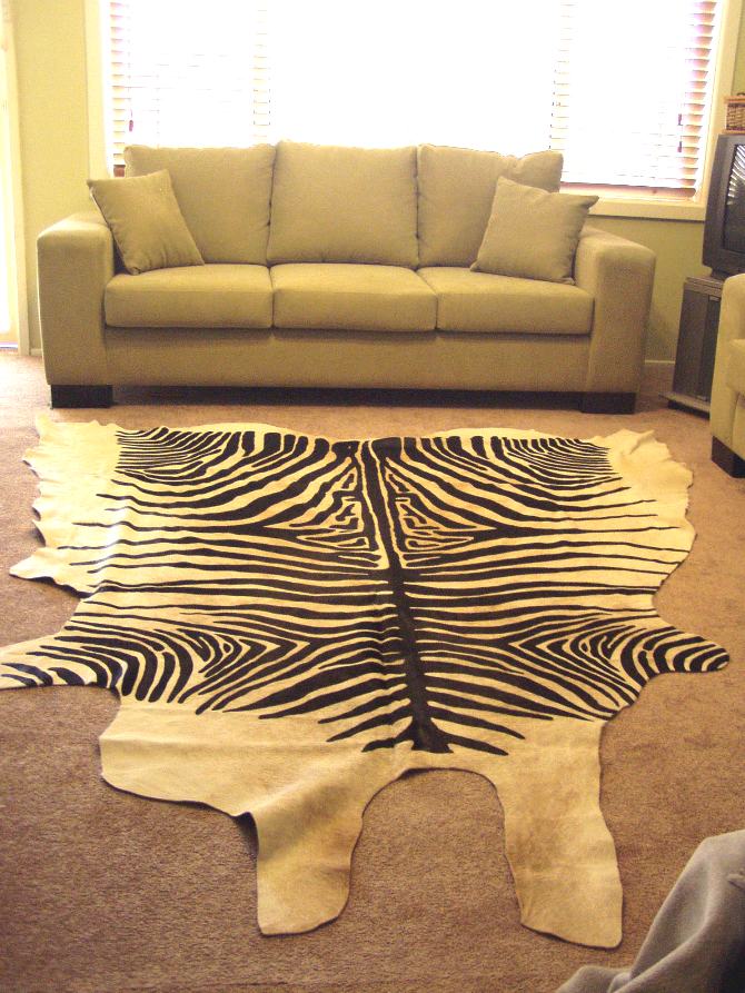 THE LUXURIOUS ZEBRA HAIR ON COW HIDE RUG :$400